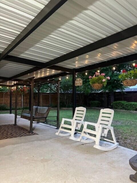Back patio porch swing and rocking chairs