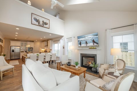 Enjoy a perfect view of the cathedral ceilings and the second-floor loft overlooking the living area.