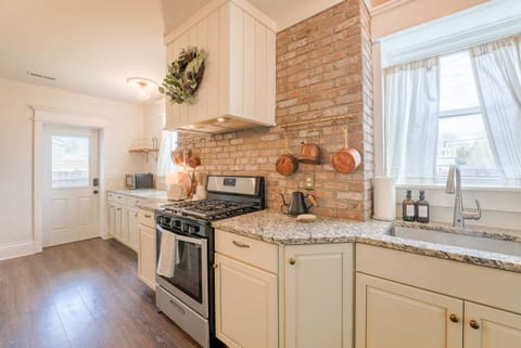 Prepare gourmet meals on the gas stove in our beautifully renovated kitchen—modern convenience meets farmhouse style.