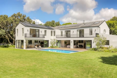 This 5 bedroom, 4.5 bathroom home has stunning lawns and heated pool.