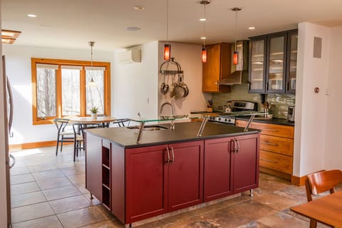 Delight in preparing your favorite meals at home with the convenience of our spacious kitchen island, offering ample room for culinary creativity.
