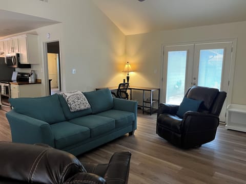 Den with additional seating & sleeper sofa for more conversation and relaxation