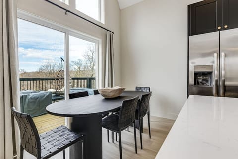 Large dining table for 6 with easy walk-out to eating on the deck! 4 additional seats at kitchen island counter top