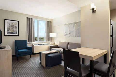 Relax on the sofa with window light and easy dining.