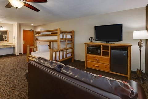 Kick back on the sofa with TV and snacks nearby.