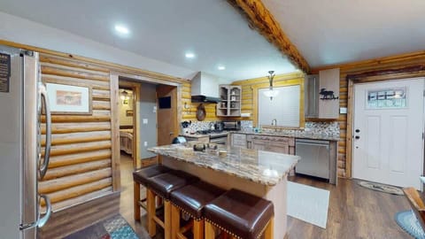 Full size kitchen with extra seating at the island.