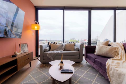 Designer Lounge Facing Lush Landscapes


