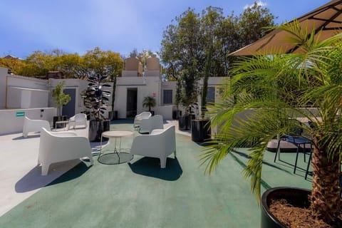 Experience the city from our communal terrace.


