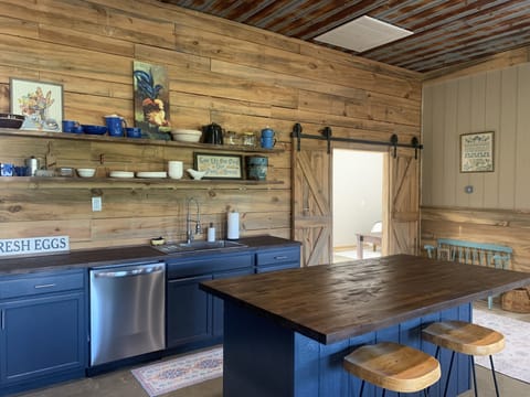 Kitchen and access to master bedroom.