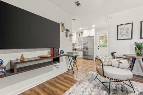 Cozy living room with 65” Smart TV