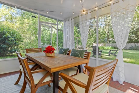 Welcoming you to experience outdoor Dining at its finest. Our covered porch is the perfect spot to savor meals surrounded by fresh air, nature, and a serene ambiance with plenty of seating space and view.