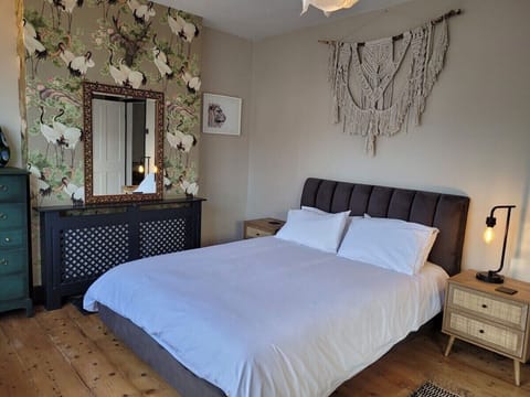 1st Floor Bedroom with king size bed and extra large wardrobe. Desk in bay window (not shown)