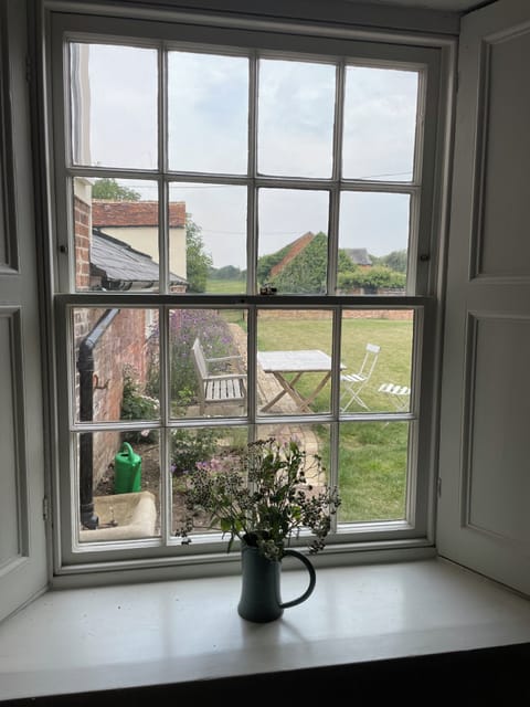 View through walled garden to open countryside from the kitchen