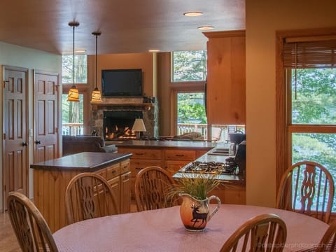 dinner table seats 8 + folding table and 4 chairs that can be added to the end