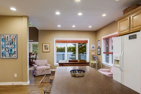 Enjoy the lake views at our Amish made dining table just off the kitchen