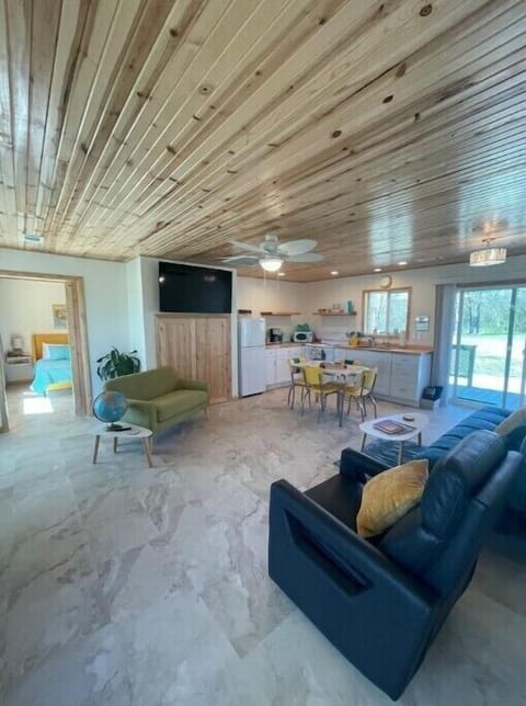 Bright and airy living space open to kitchen with plenty of room for family fun.