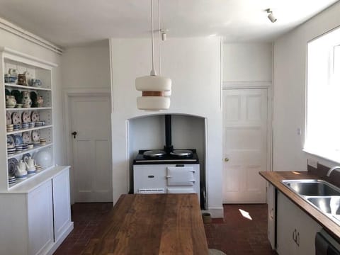 Kitchen, with two oven Aga cooker, island, dresser