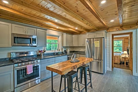 Sleek and Stylish: Where Grey Cupboards and Stainless Appliances Define Modern Elegance