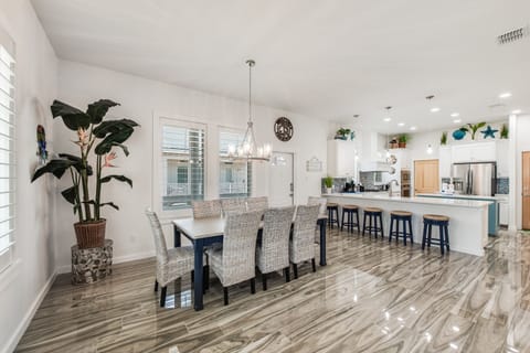 Interior - Share meals and laughter in the stylish dining area, enhanced by the coastal ambiance.