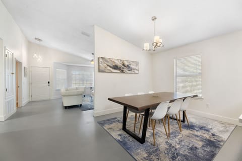 Modern dining for 8 in Navarre Beach—perfect for family dinners and game nights.