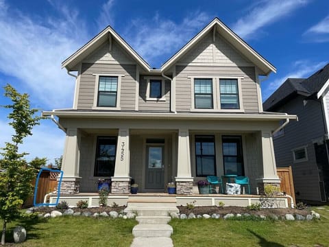 Front of home with separate entrance to suite on the left side of the house