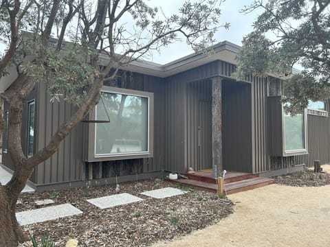 Architectural home blends effortlessly into the landscape
