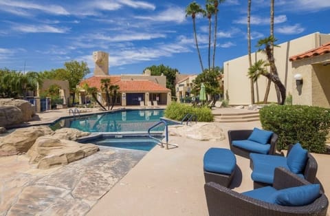 Hot tub jacuzzi and outdoor furniture available at pool area