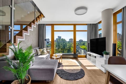 Comfortable Living Room with Sofa Bed and Smart TV | Book Now with RENTUJEMY
