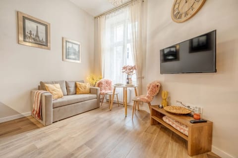 Comfortable Living Room with Sofa Bed and Smart TV | Book Now with RENTUJEMY