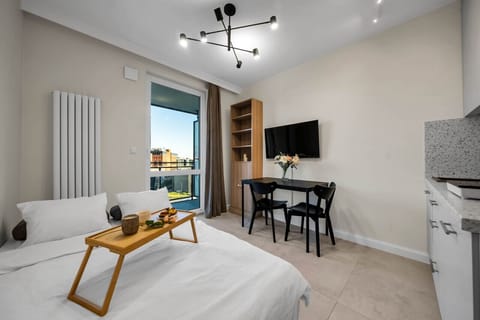Living room with TV | Book Now with RENTUJEMY.COM