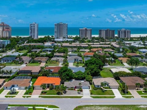 Aerial with house just blocks from the beach!