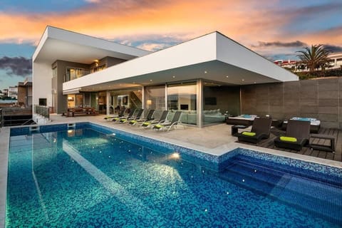 Pool and villa in the evening