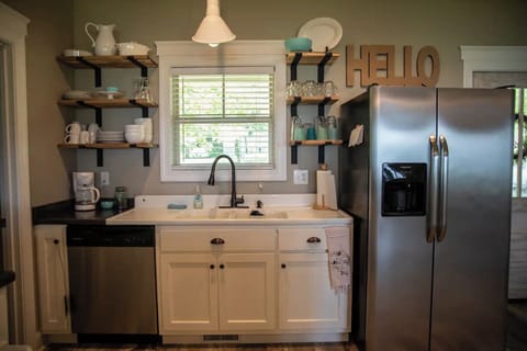 75 year old vintage porcelain sink with double drain boards