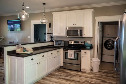 Fully stocked kitchen with stainless steel appliances
