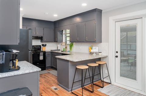 Kitchen with covered porch off the back