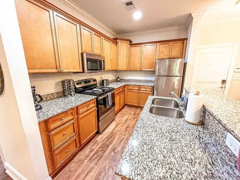 Kitchen with lots of storage, cleaning closet and pantry 