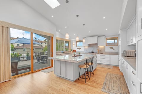 Fully stocked kitchen (upstairs) with access to the balcony