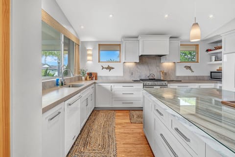 Fully stocked kitchen (upstairs) with access to the balcony