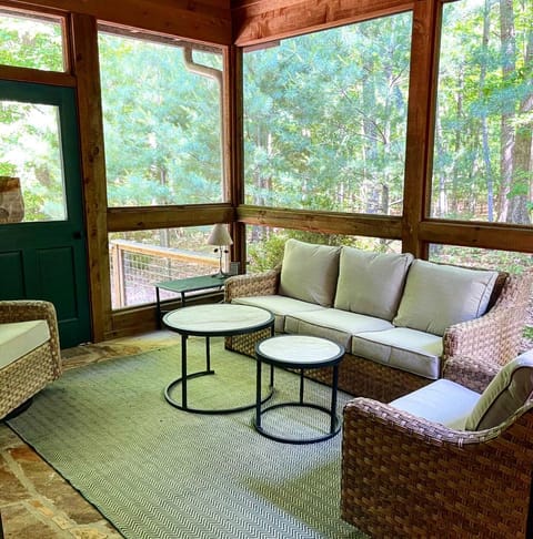 Screened porch with wood burning fire 