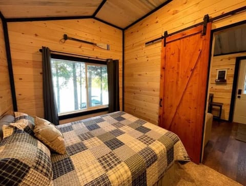 Queen bedroom with beautiful lake view.