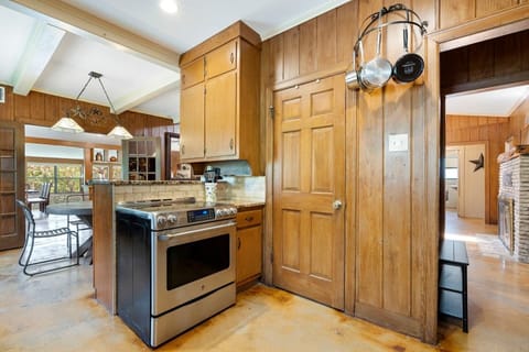 Kitchen area.  Pots on wall are just a few of the total we have.