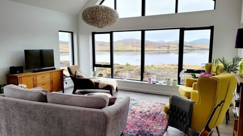 The relaxing lounge features a 2 person sofa, two comfortable arm chairs and a beautiful chaise.