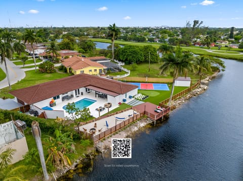 Enjoy Riverside Opulence with Miniature Beach Scenery