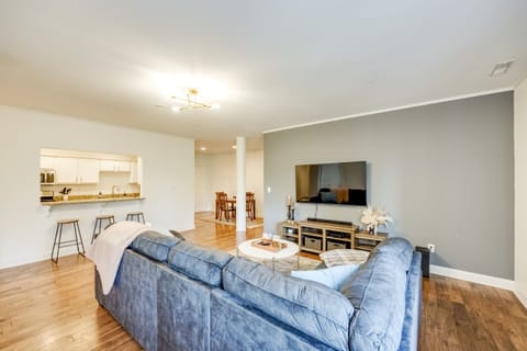 Full view of the living room showcasing the open-plan layout that extends into the dining area—ideal for entertaining.