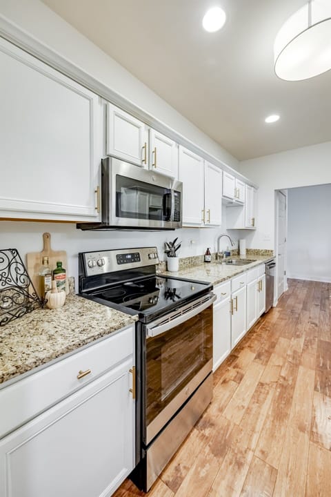 Full view of the living room showcasing the open-plan layout that extends into the dining area—ideal for entertaining.