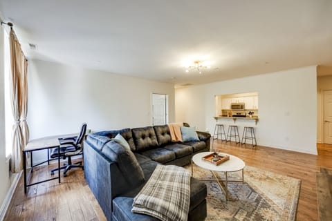 Full view of the living room showcasing the open-plan layout that extends into the dining area—ideal for entertaining.