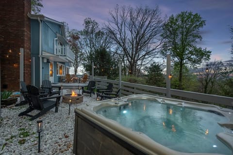 Sit back and relax by the fire pit and hot tub
