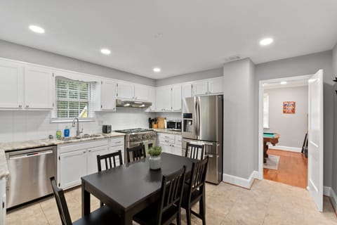 Fully Equipped Kitchen and Dining Area 