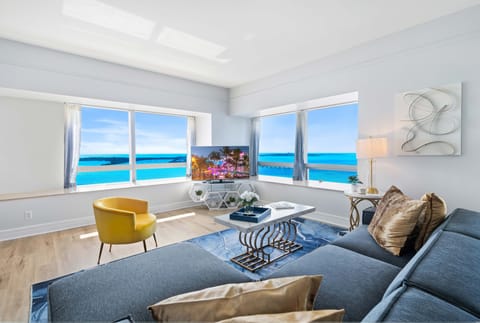 Living Area of the Condo in Miami Florida - Cozy seating area conducive to relaxation and socializing - Amazing ocean view - Well-chosen seating adding both functionality and charm - Smart TV and Netflix