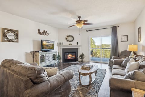 Spacious Living Room with Gas Fireplace, Sleeper Sofa and SMART TV with Cable & WIFI throughout vacation rental